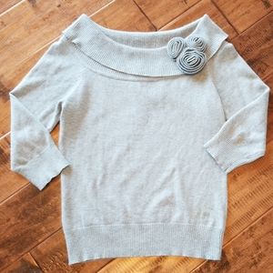 Off the shoulder grey sweater with rosette